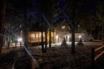 Magical Woodside Lodge at Night